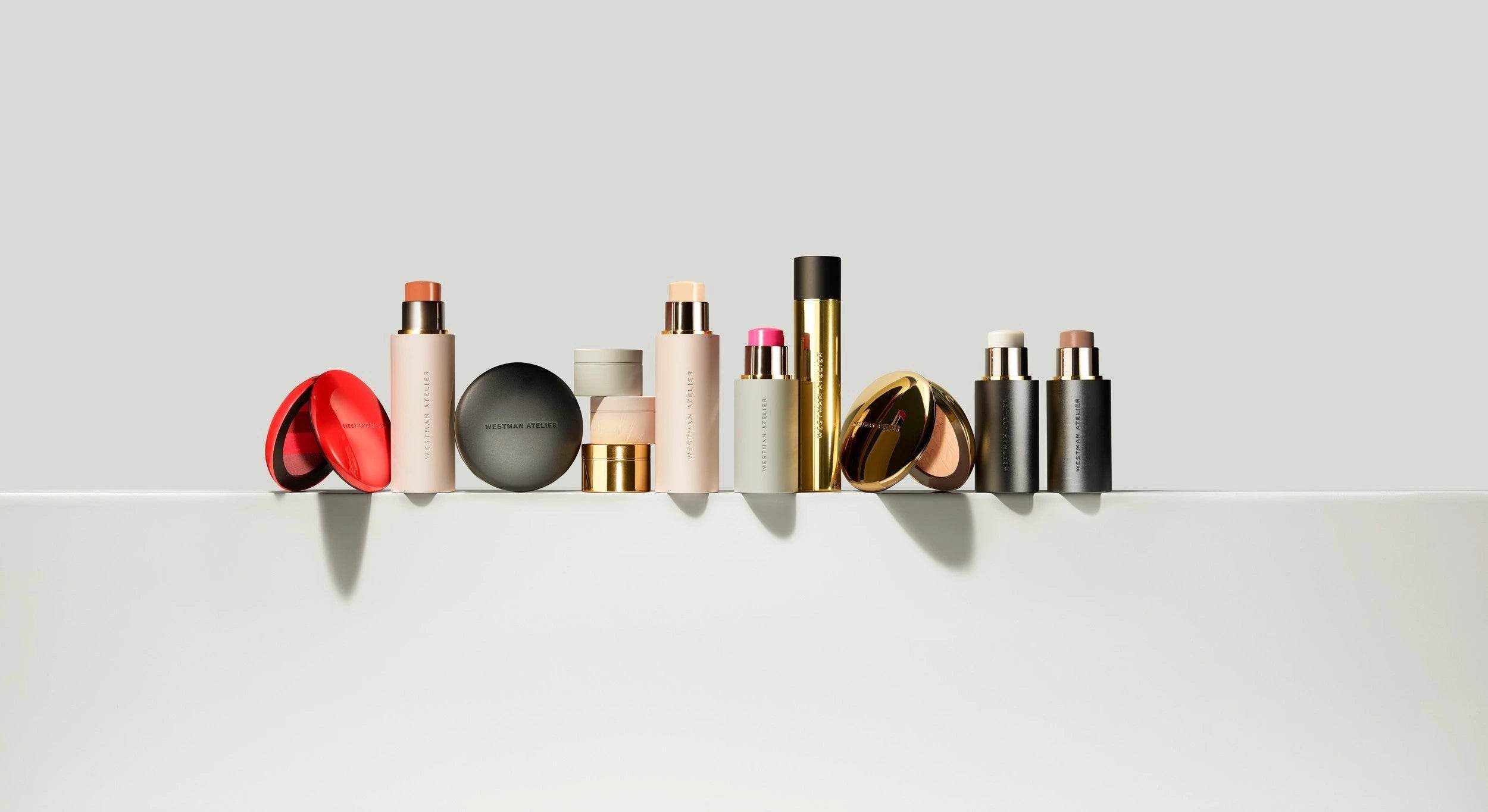 Westman Atelier makeup collection featuring diverse luxury cosmetic products in sleek packaging