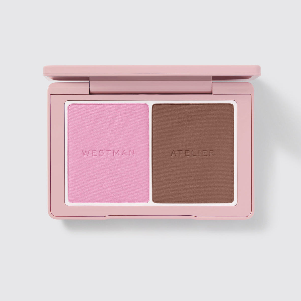 Westman Atelier Powder Duos compact featuring a pink blush and a warm bronzer for easy makeup application