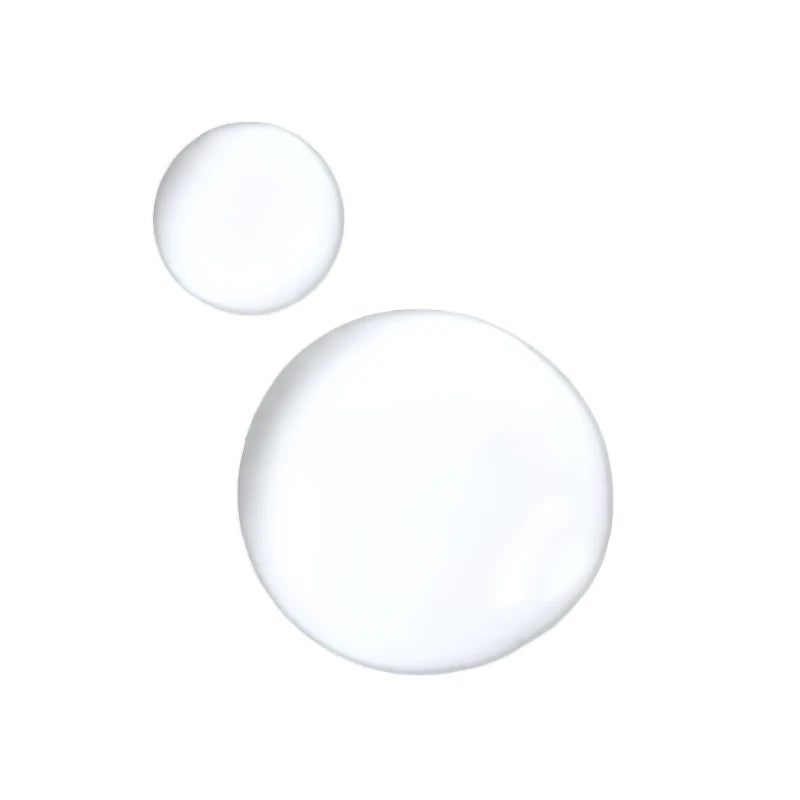Drops of Augustinus Bader The Essence, a lightweight skincare serum for radiant skin
