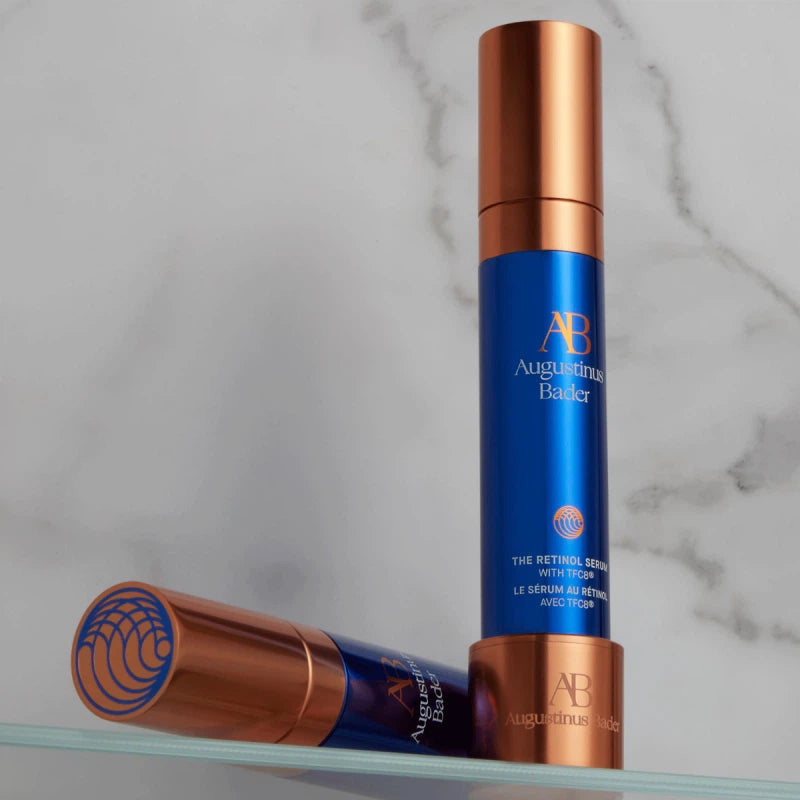 Augustinus Bader The Retinol Serum in a blue and gold bottle for youthful skin renewal