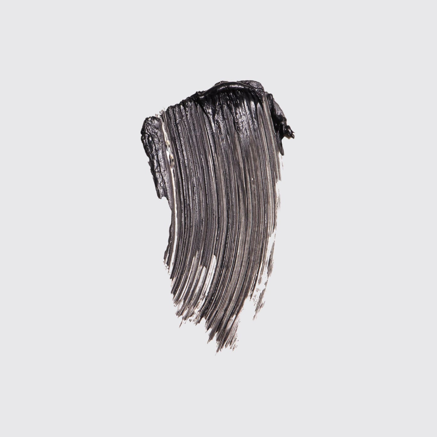Swatch of Westman Atelier Buildable Mascara in rich black for a bold and defined lash look