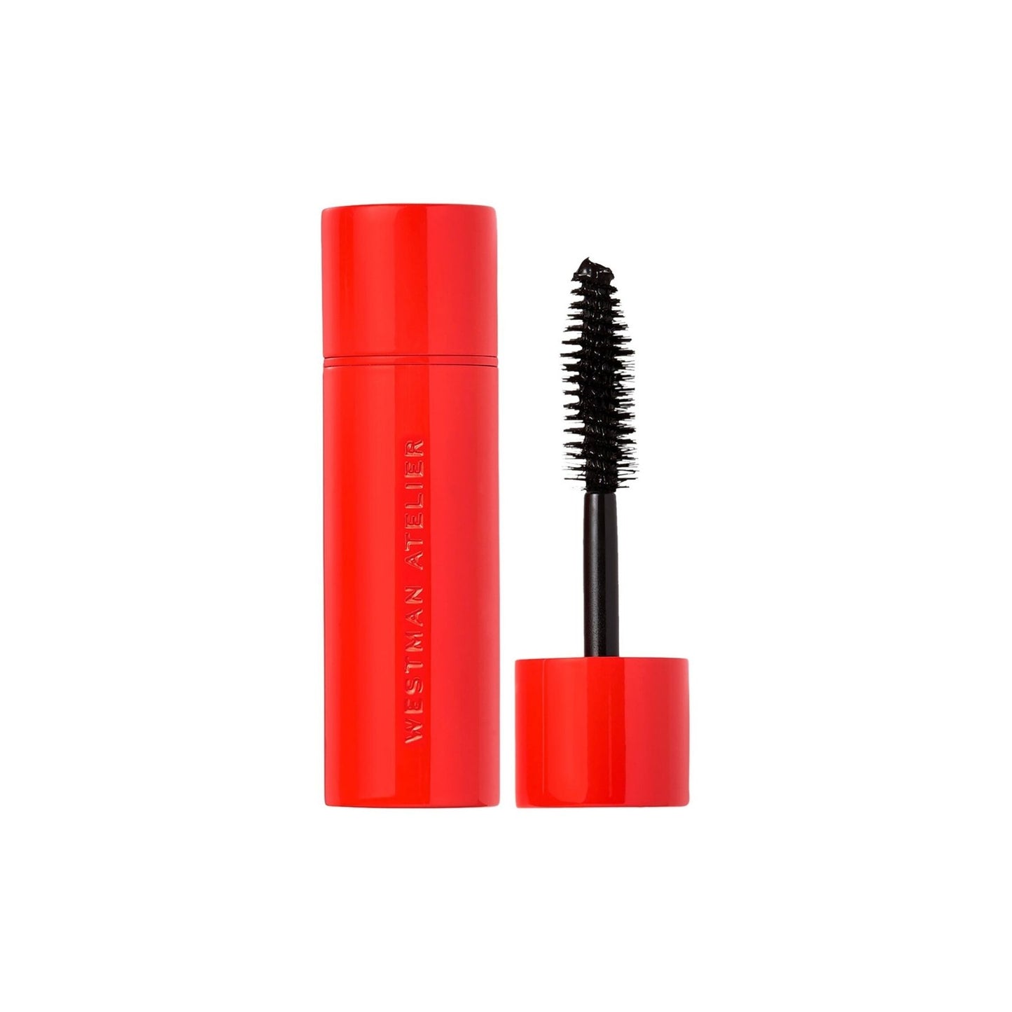 Westman Atelier Buildable Mascara in bold red packaging with an applicator brush for lush lashes