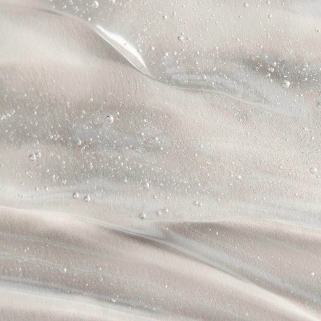 Close-up texture of Goldfaden MD Fresh A Peel | Multi Acid Resurfacing Peel gel with small air bubbles