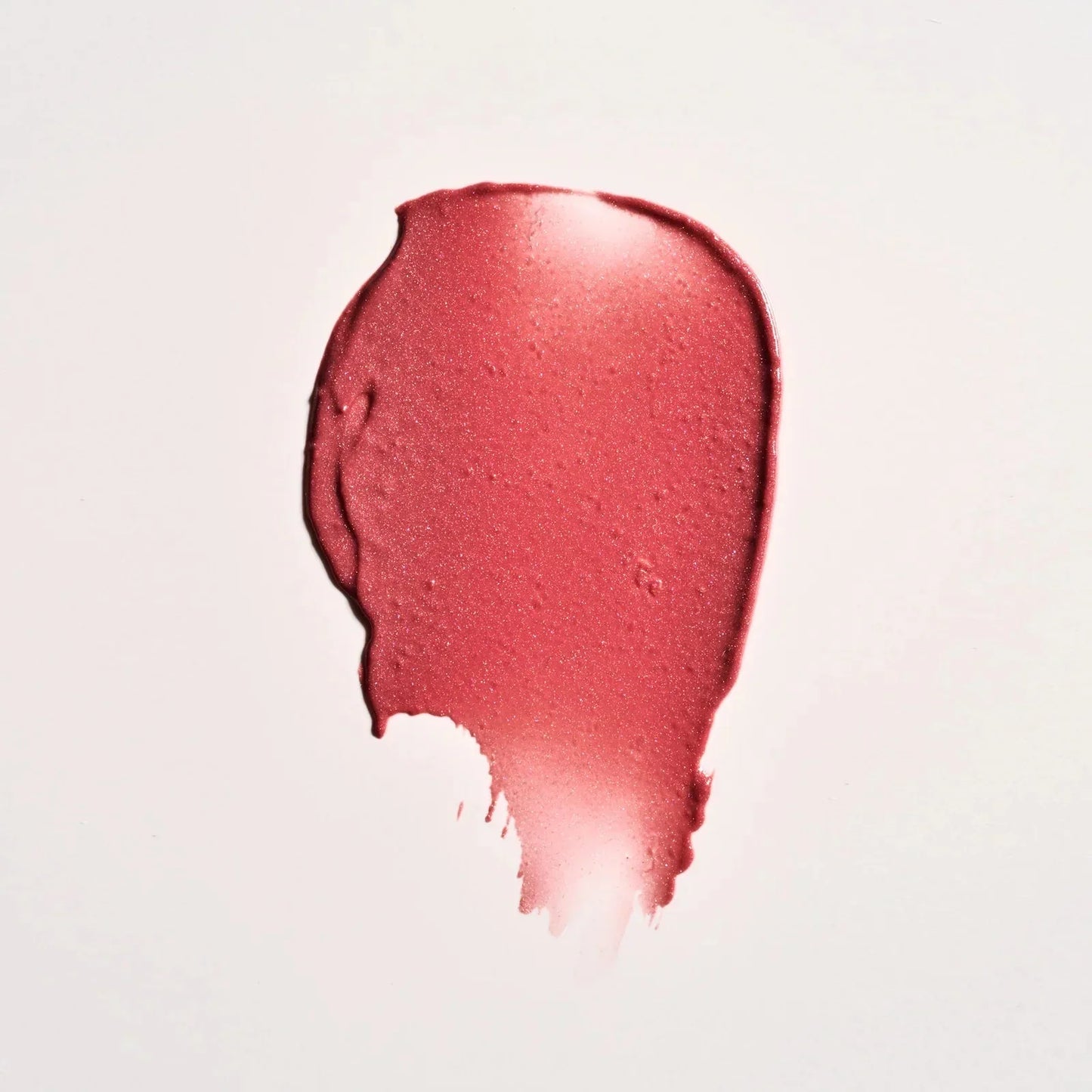Westman Atelier Highlight Stick in a soft rose shade for a luminous glow on the skin