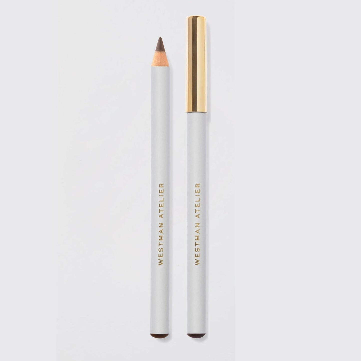 Westman Atelier Kohl Eye Pencil in gray with a sleek gold cap for precise eye makeup application