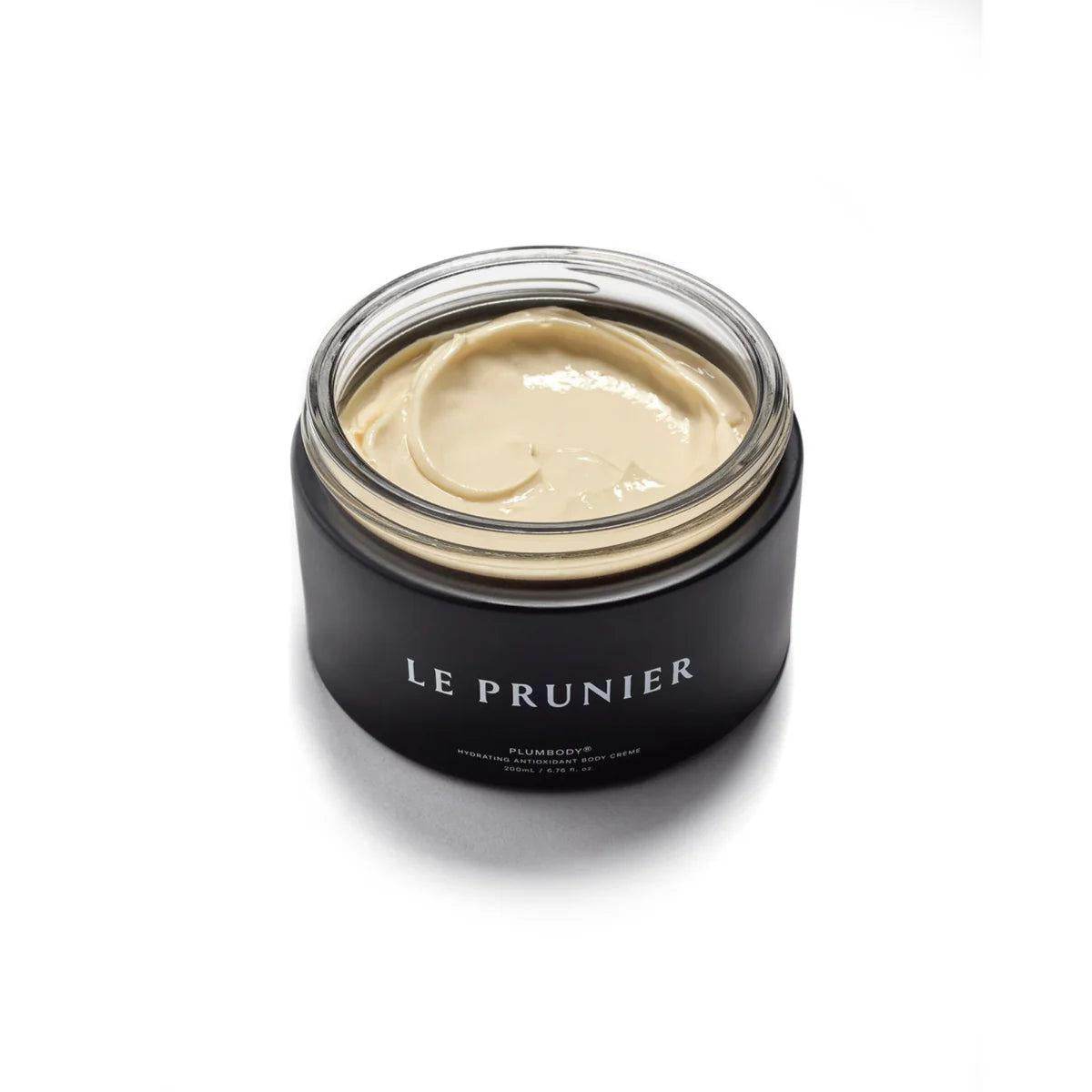 Le Prunier Plumbody Plum Oil Body Cream open jar showing creamy texture