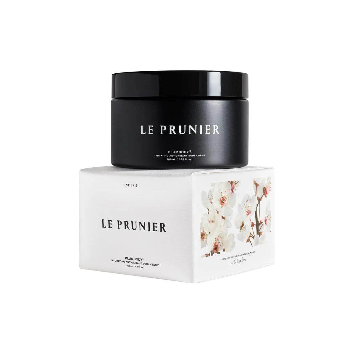 Le Prunier Plumbody Plum Oil Body Cream in black jar with white floral box packaging
