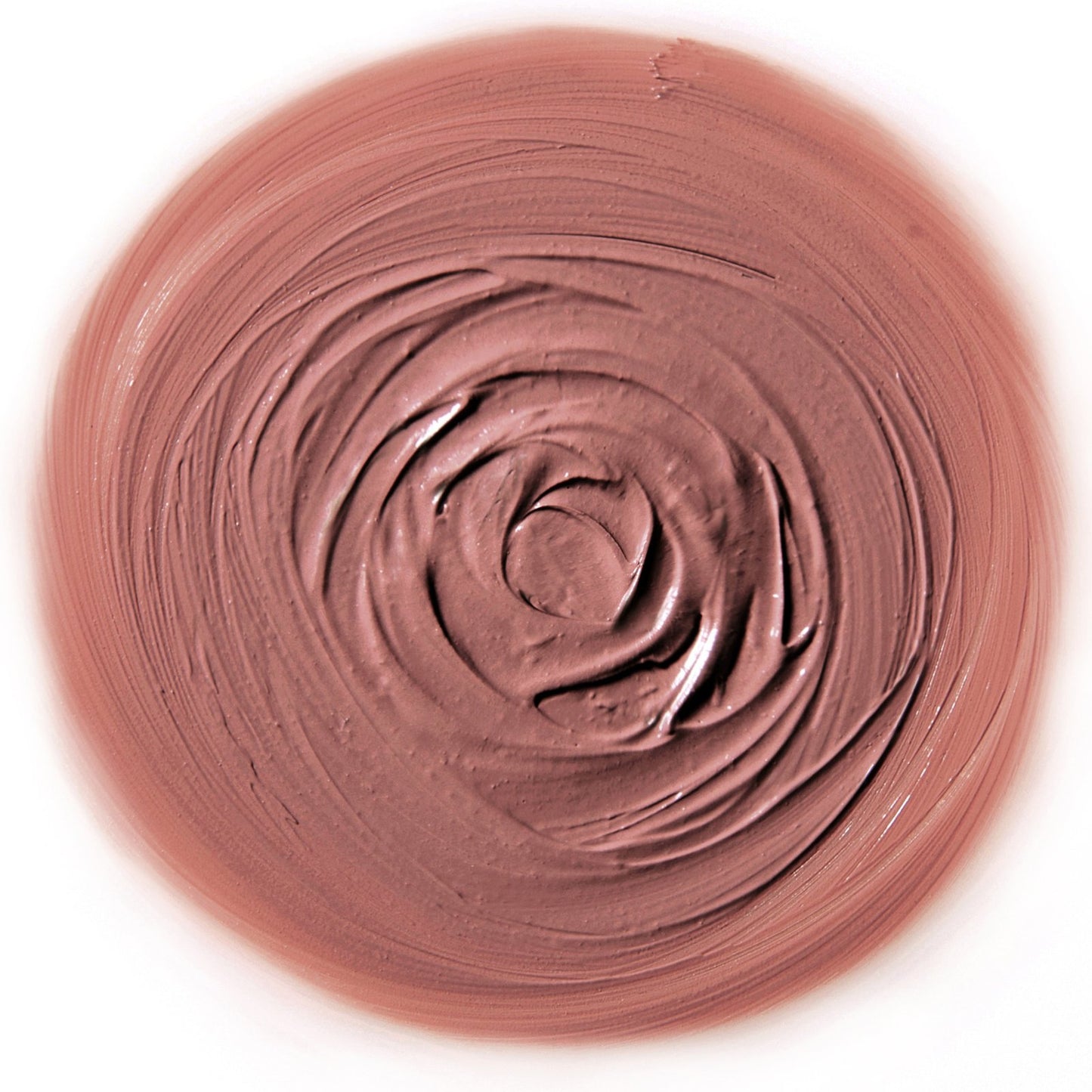 Rituel de Fille Lipstick in a muted nude shade with creamy, smooth texture swirled on a surface