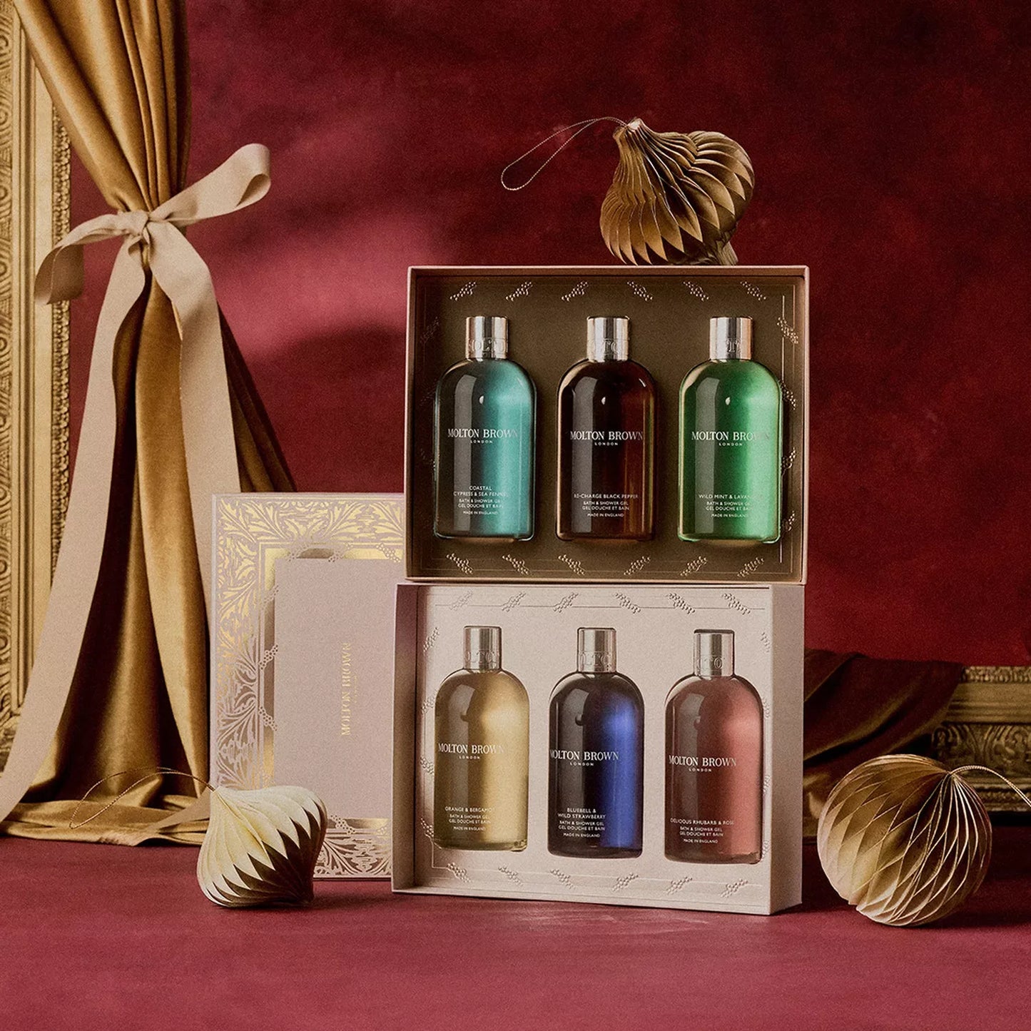 Molton Brown floral and fruity body care set featuring six luxurious body washes in elegant packaging