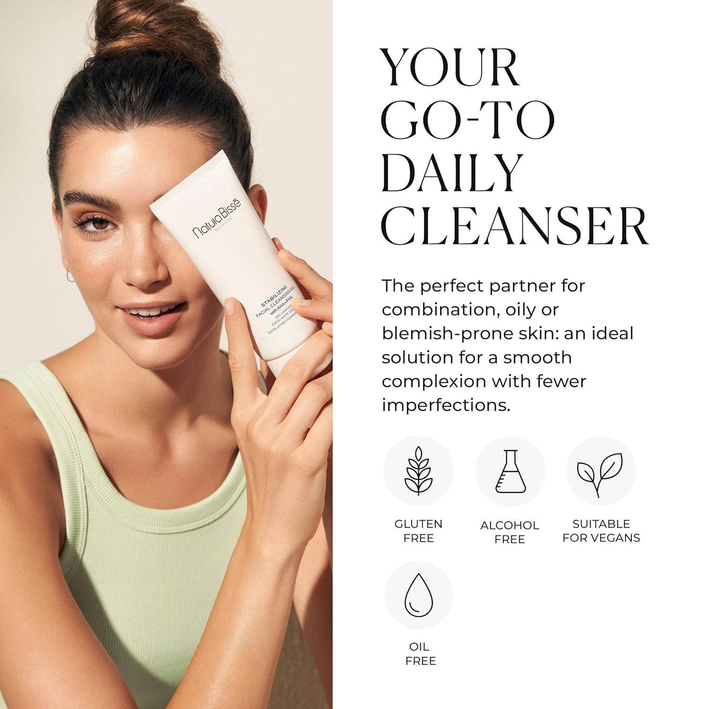 Natura Bisse Cleansing Exfoliating Gel held by woman with clear skin promoting daily cleanser benefits