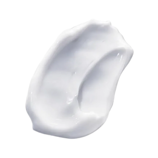 Smooth texture of Natura Bissé Comfort Creamy Cleanser on a dark background