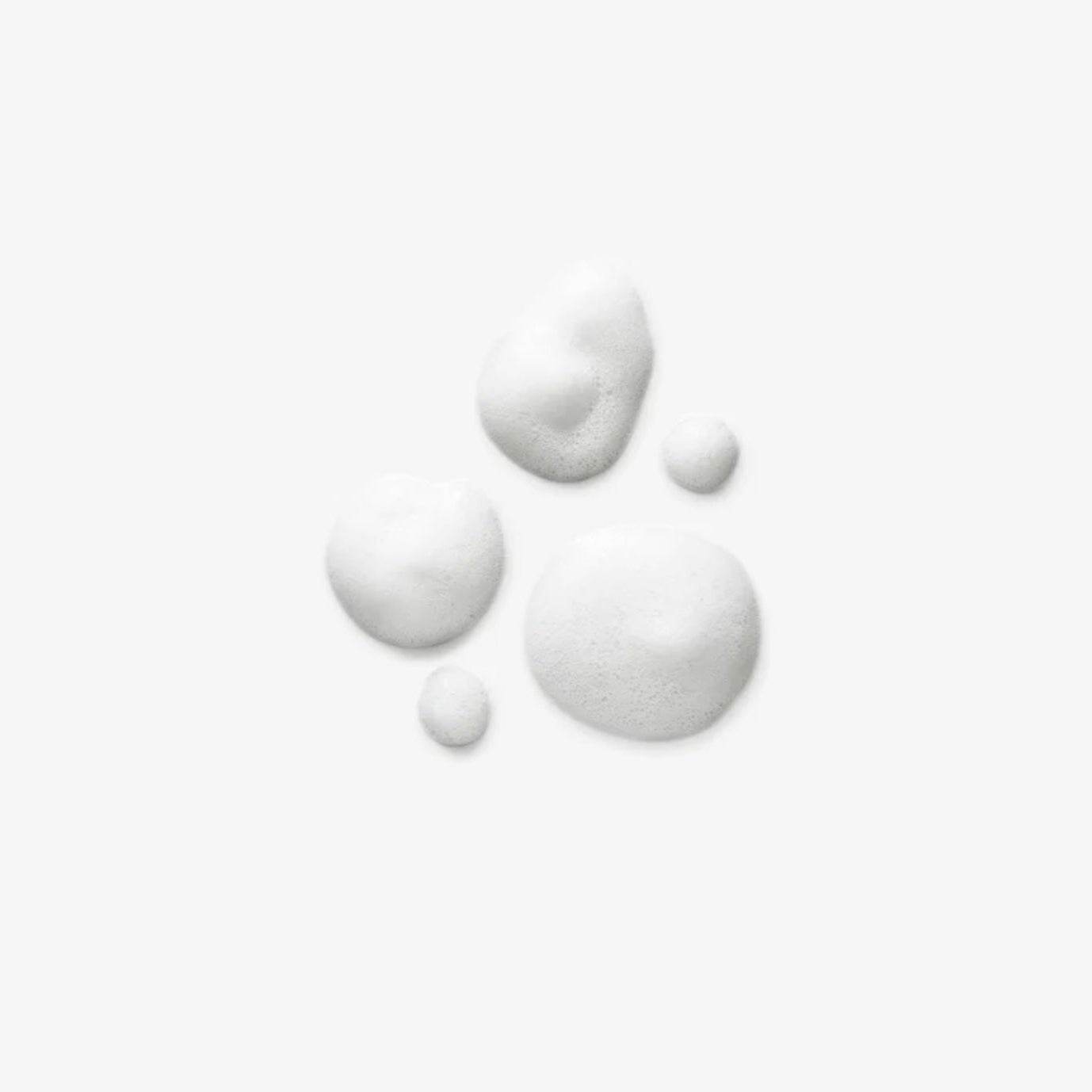 Natura Bissé Fresh Foaming Cleanser white foamy texture bubbles on a clean background