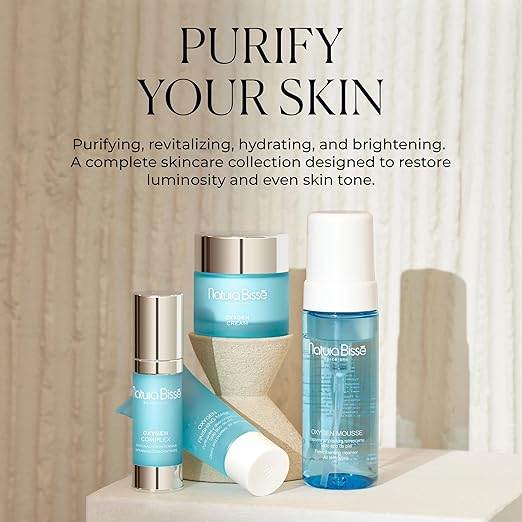 Natura Bissé Fresh Foaming Cleanser blue bottle with skincare collection to purify and hydrate skin