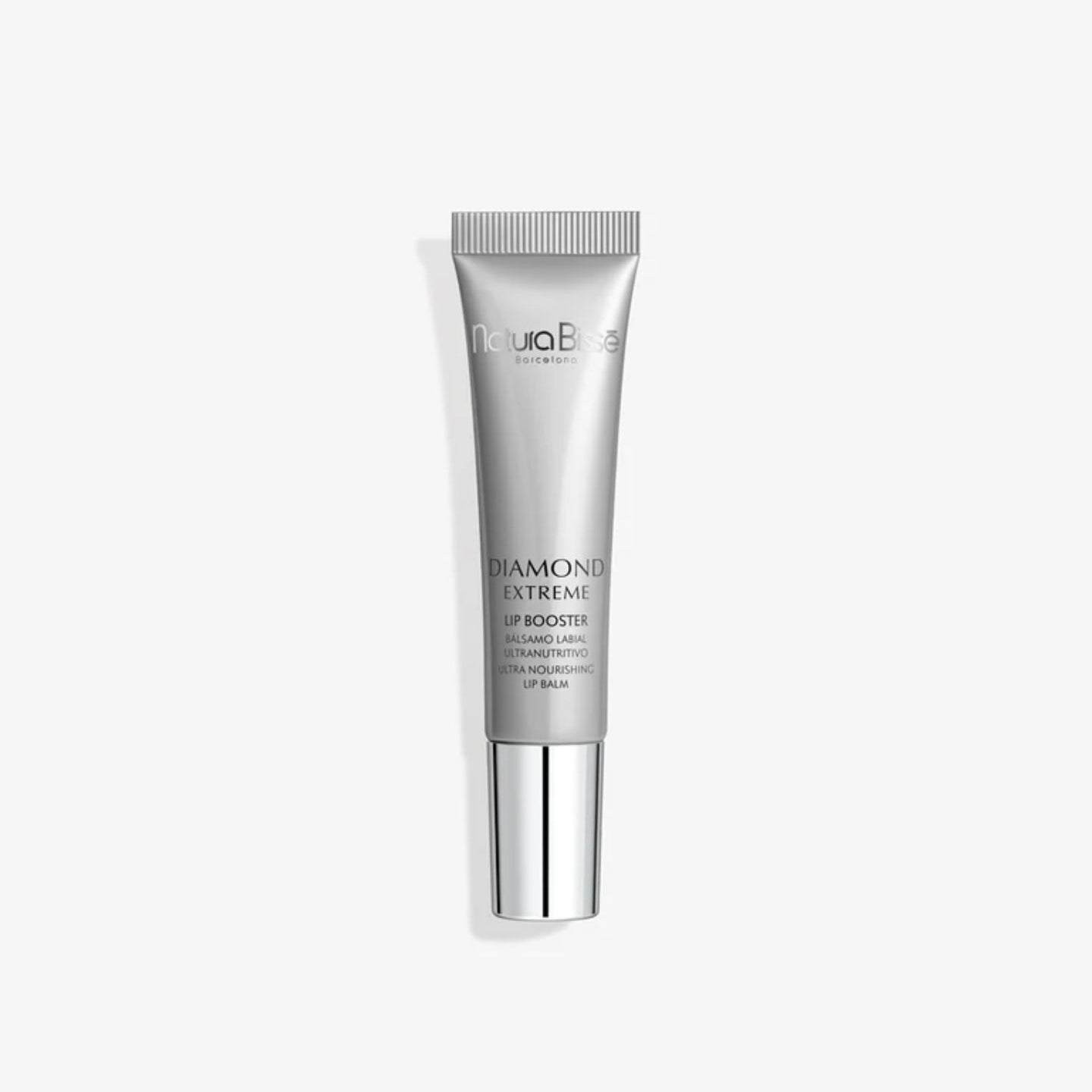 Natura Bisse Diamond Extreme Nourishing Lip Serum in silver tube with shiny cap