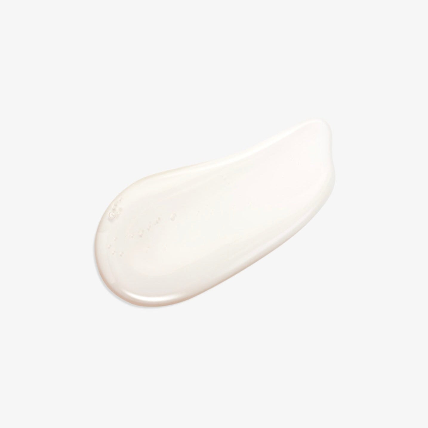 Clear smear of Natura Bisse Nourishing Lip Serum showing texture and hydration properties
