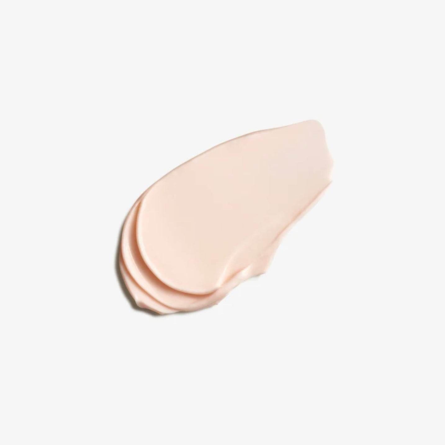 Smooth light pink cream texture of Natura Bisse Diamond Extreme Body Cream Age Defying Body Cream