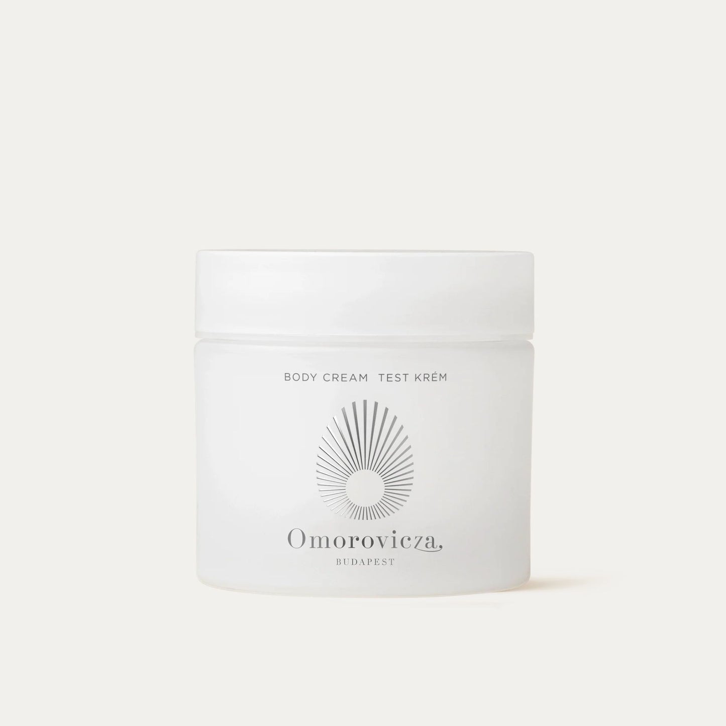 Omorovicza Body Cream in a sleek white jar for nourishing and hydrating the skin