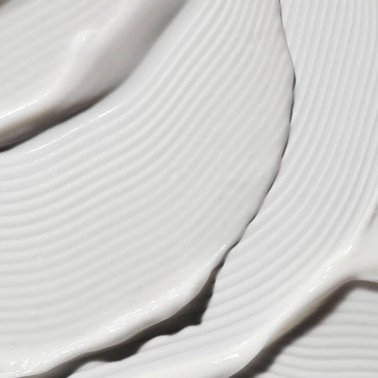 Close-up of Omorovicza Illuminating Moisturizer showcasing its creamy texture for a radiant complexion