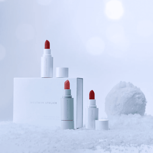Westman Atelier luxury matte lipstick gift set featuring three vibrant shades elegantly displayed on snowy background