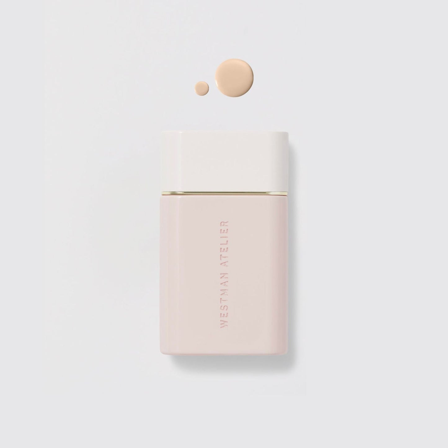 Westman Atelier Radiant Skin Tint in a beige bottle with a drop of product for a natural glow