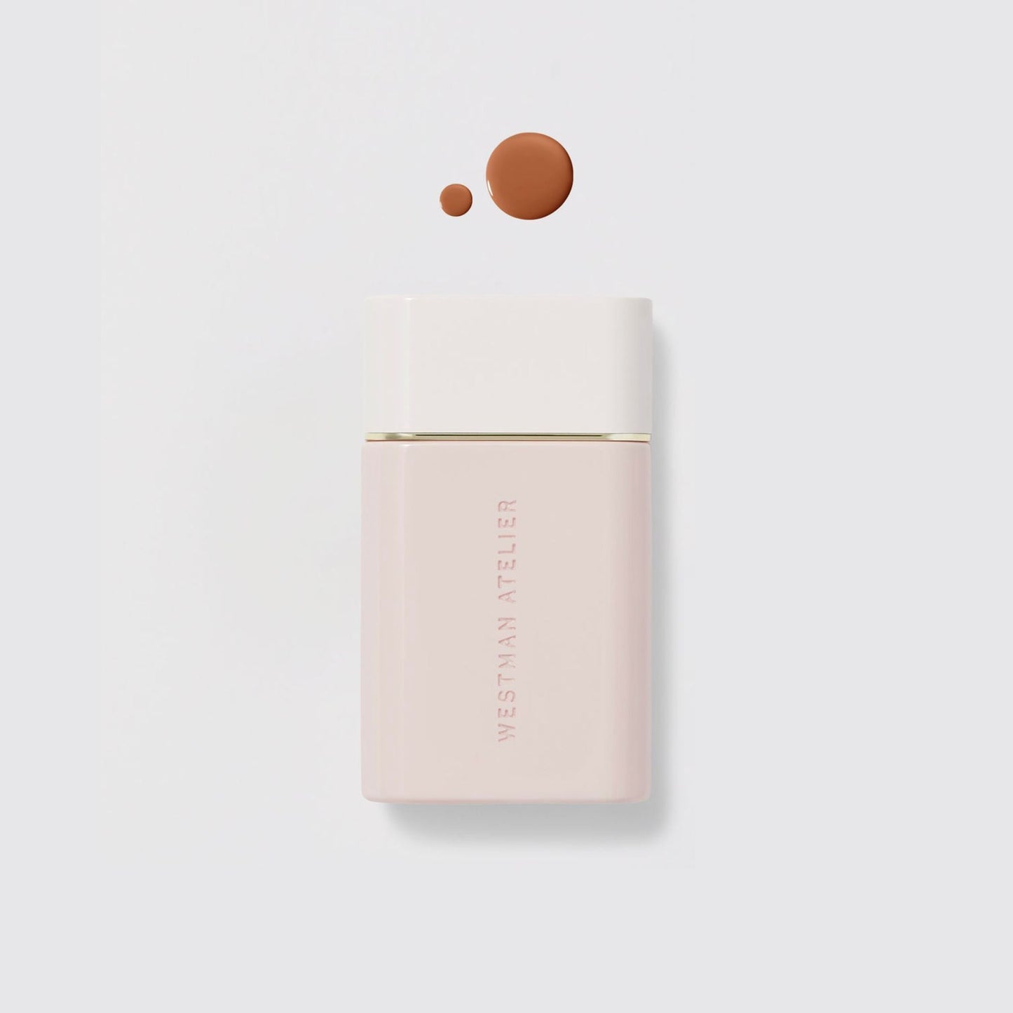 Westman Atelier Radiant Skin Tint in a sleek bottle with a drop of rich tint shade above