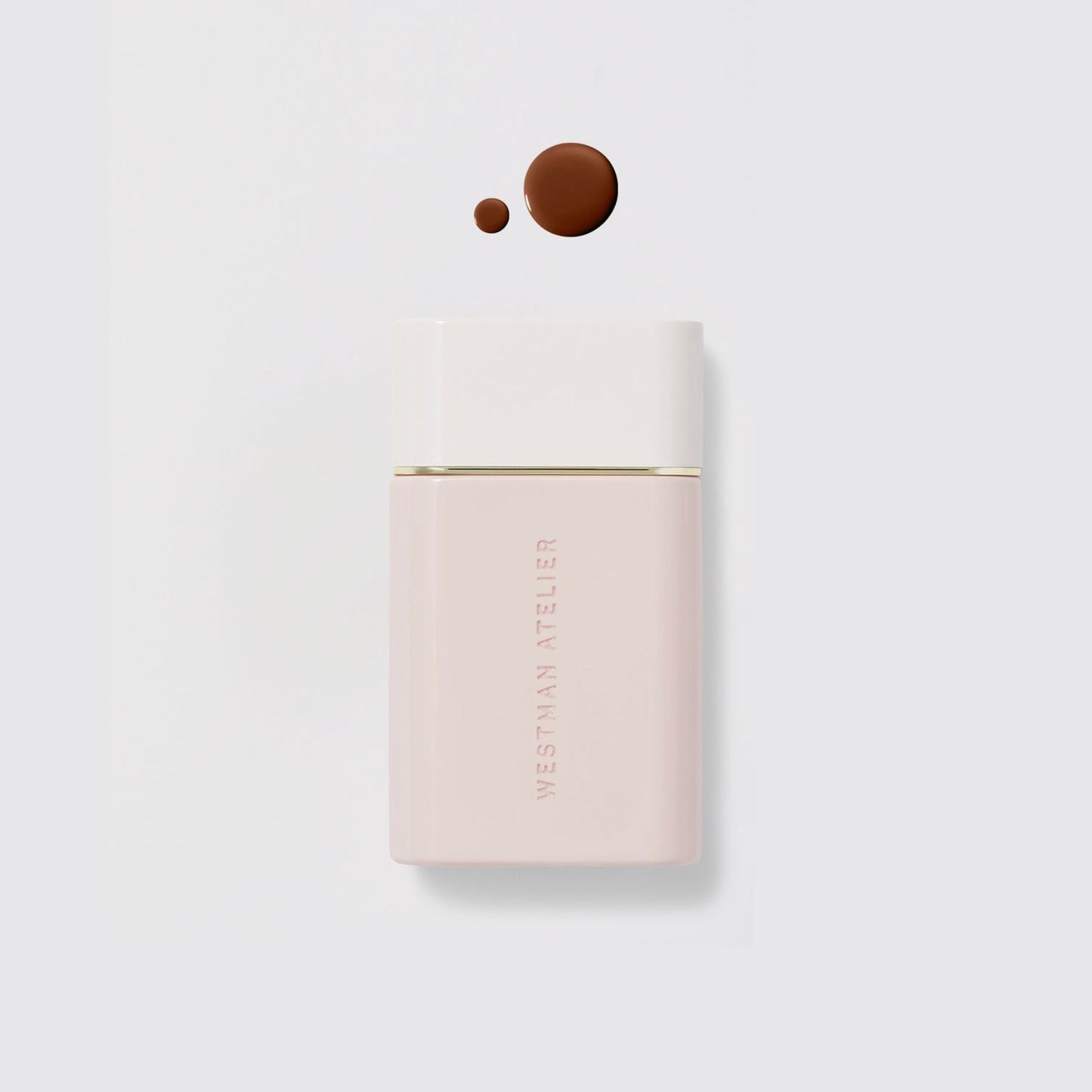 Westman Atelier Radiant Skin Tint in a sleek bottle with a drop of rich tint for a flawless finish