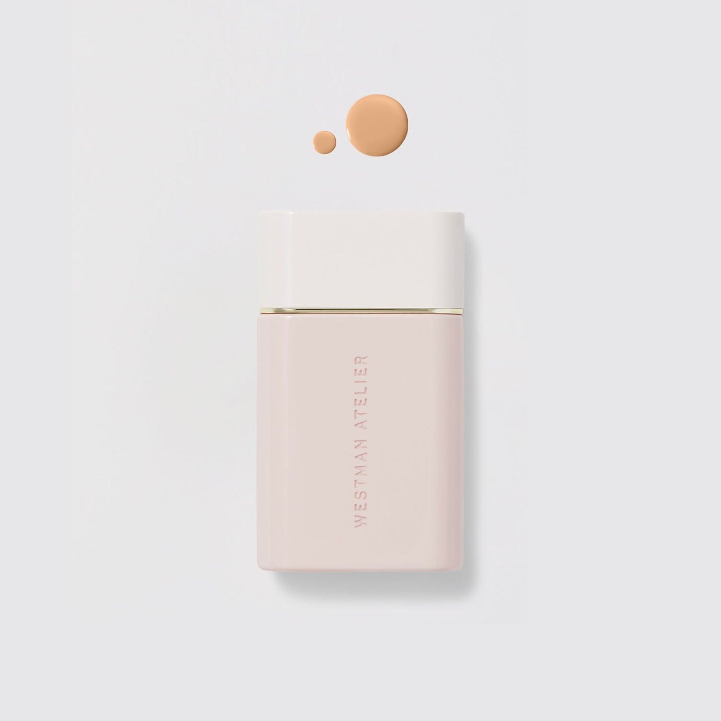 Westman Atelier Radiant Skin Tint in a sleek bottle with a drop of shade above for flawless application