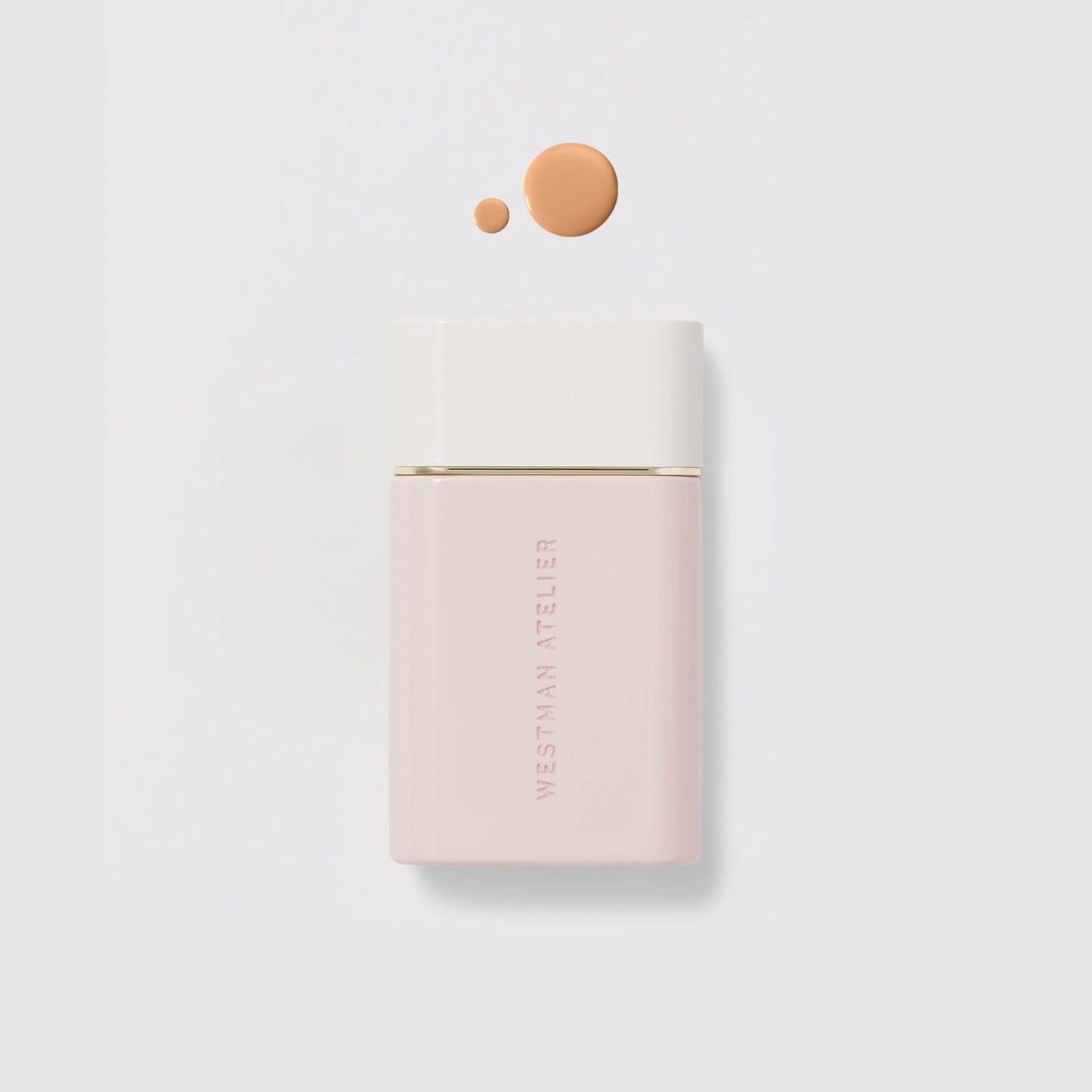 Westman Atelier Radiant Skin Tint in a sleek container with a drop of tinted formula above