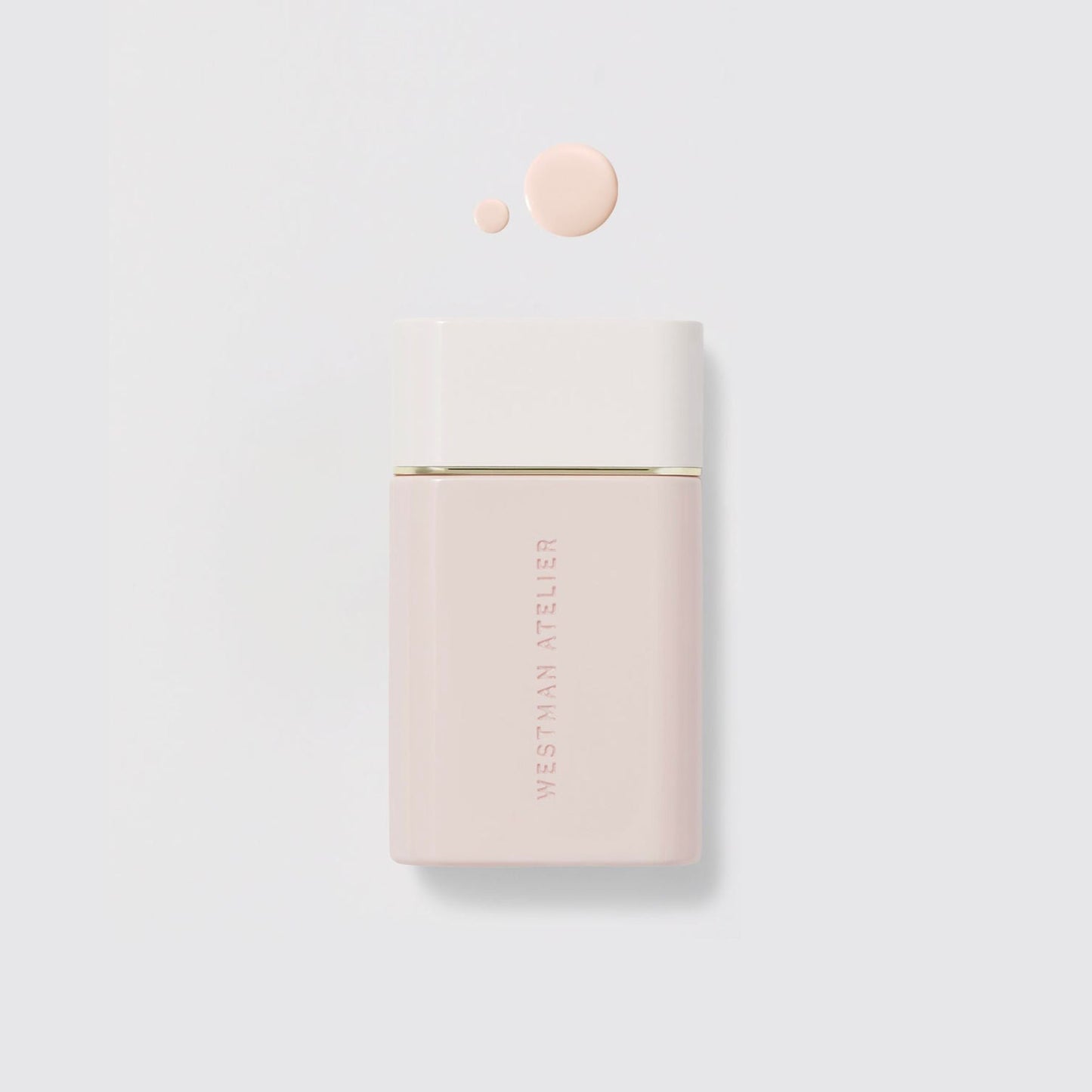 Westman Atelier Radiant Skin Tint in a sleek container with a drop of product for glowing skin