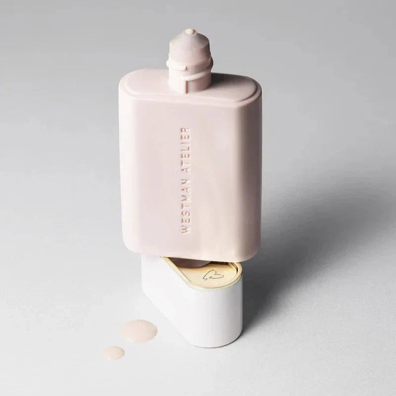 Westman Atelier Radiant Skin Tint in a sleek bottle with a smooth spill for a natural glow