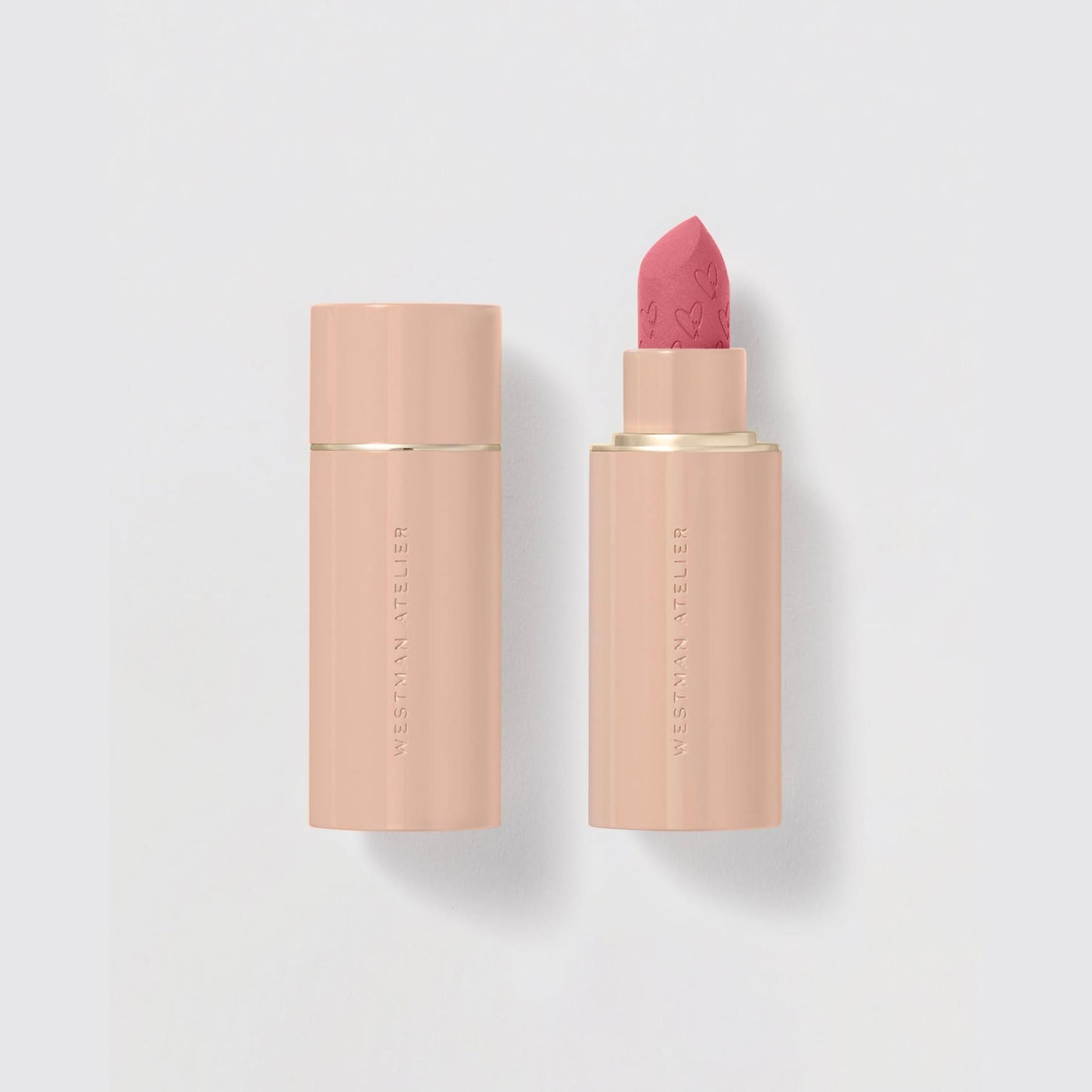 Westman Atelier Comfortable Matte Lipstick in soft pink shade with elegant packaging