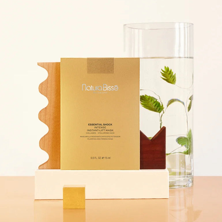 Natura Bissé skincare product with packaging on a beige background