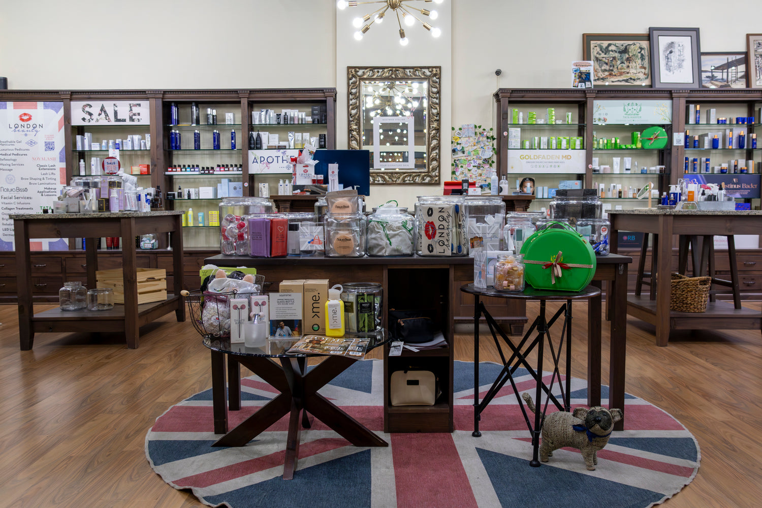 Store interior with product displays and a dog on a rug