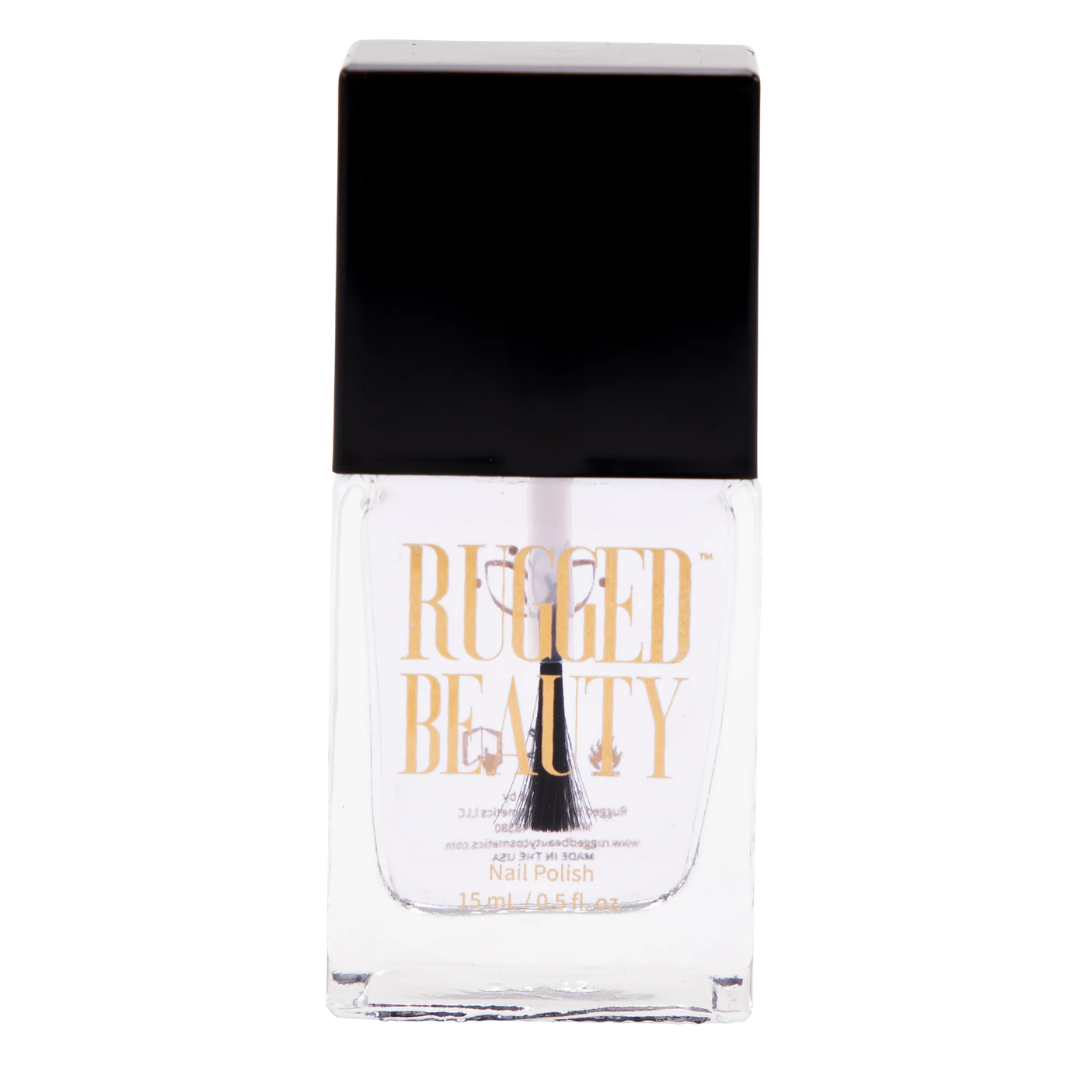 A bottle of Rugged Beauty clear nail polish with a black cap and gold lettering on the front, set against a plain white background.