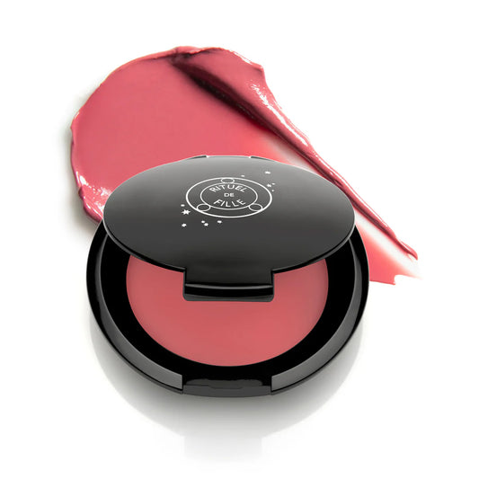 Rituel de Fille Jelly Blush and Lip Color in a compact with a smear of color beside it
