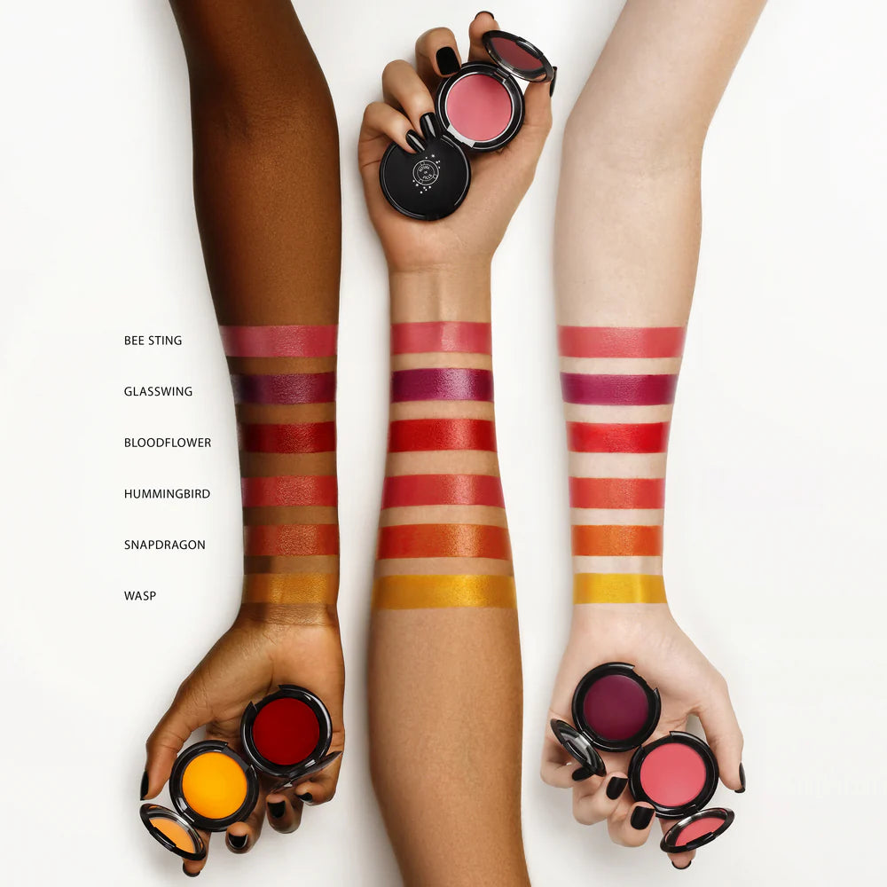 Swatches of Rituel de Fille Jelly Blush and Lip Color on diverse skin tones for vibrant color options