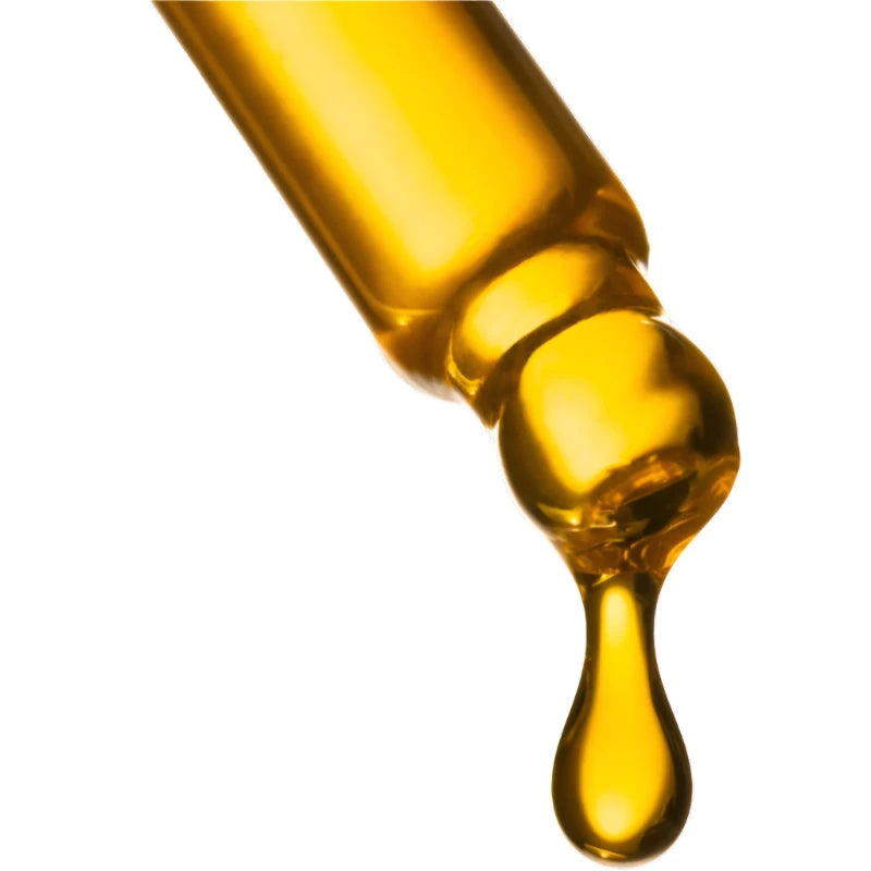 Augustinus Bader Face Oil dropper with nourishing golden oil for radiant skin