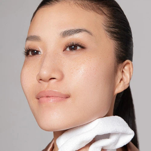 A model showcasing fresh skin after using luxury cream cleansing gel from Augustinus Bader