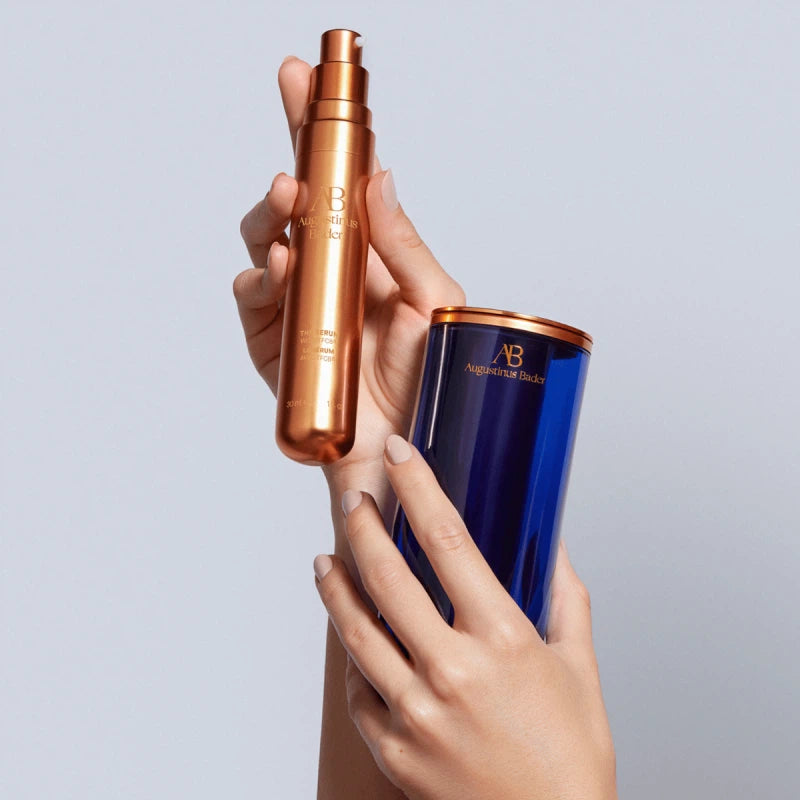 Augustinus Bader The Serum in a luxurious copper bottle for radiant and rejuvenated skin