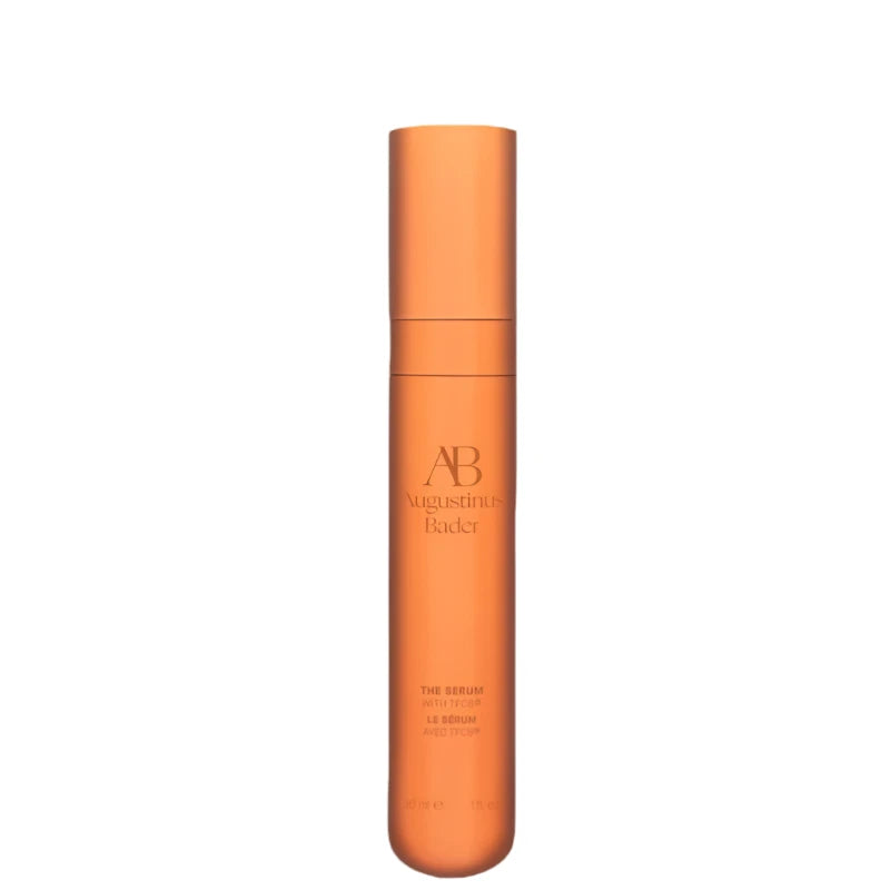 Augustinus Bader The Serum in an orange bottle for skin hydration and rejuvenation