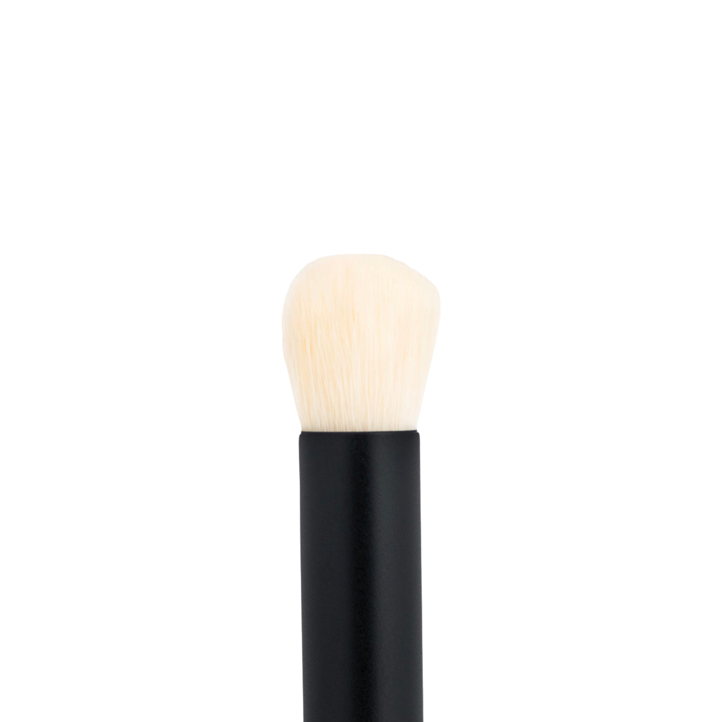 Westman Atelier Baby Blender Brush with a tapered head for precise application of makeup products