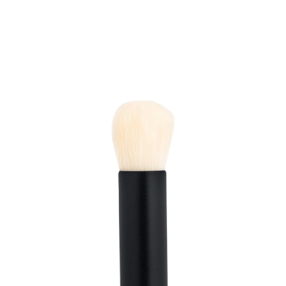 Westman Atelier Baby Blender Brush with a tapered head for precise application of makeup products