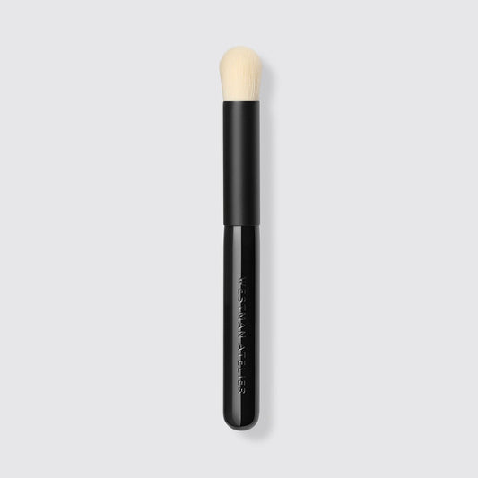 Westman Atelier Baby Blender Brush with a soft tapered tip for seamless makeup application