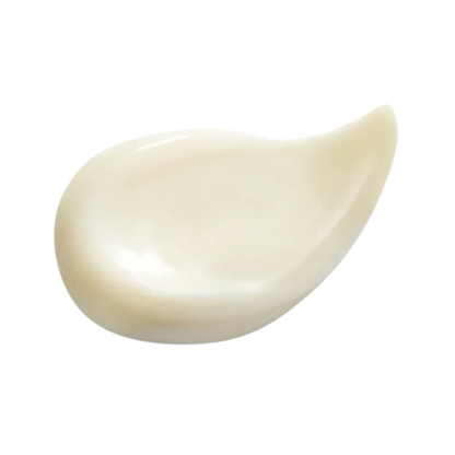 Natura Bisse Firming Serum displayed on a black background, showcasing its smooth, creamy texture