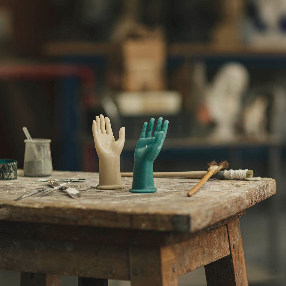 Trudon Cherub Hand Sculptures in Beige and Green on a Vintage Workbench