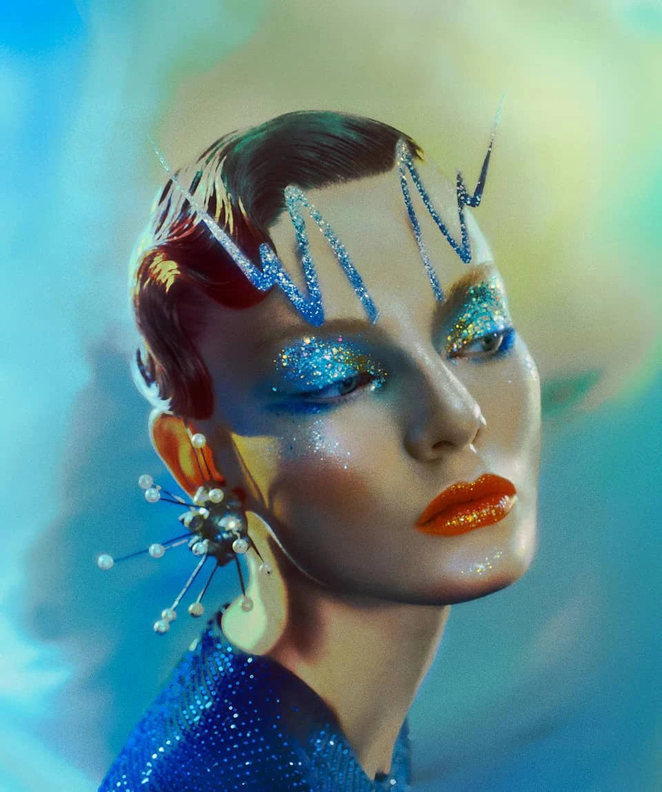 Stunning model with unique makeup and accessories showcasing a unique Gourmand fragrance theme