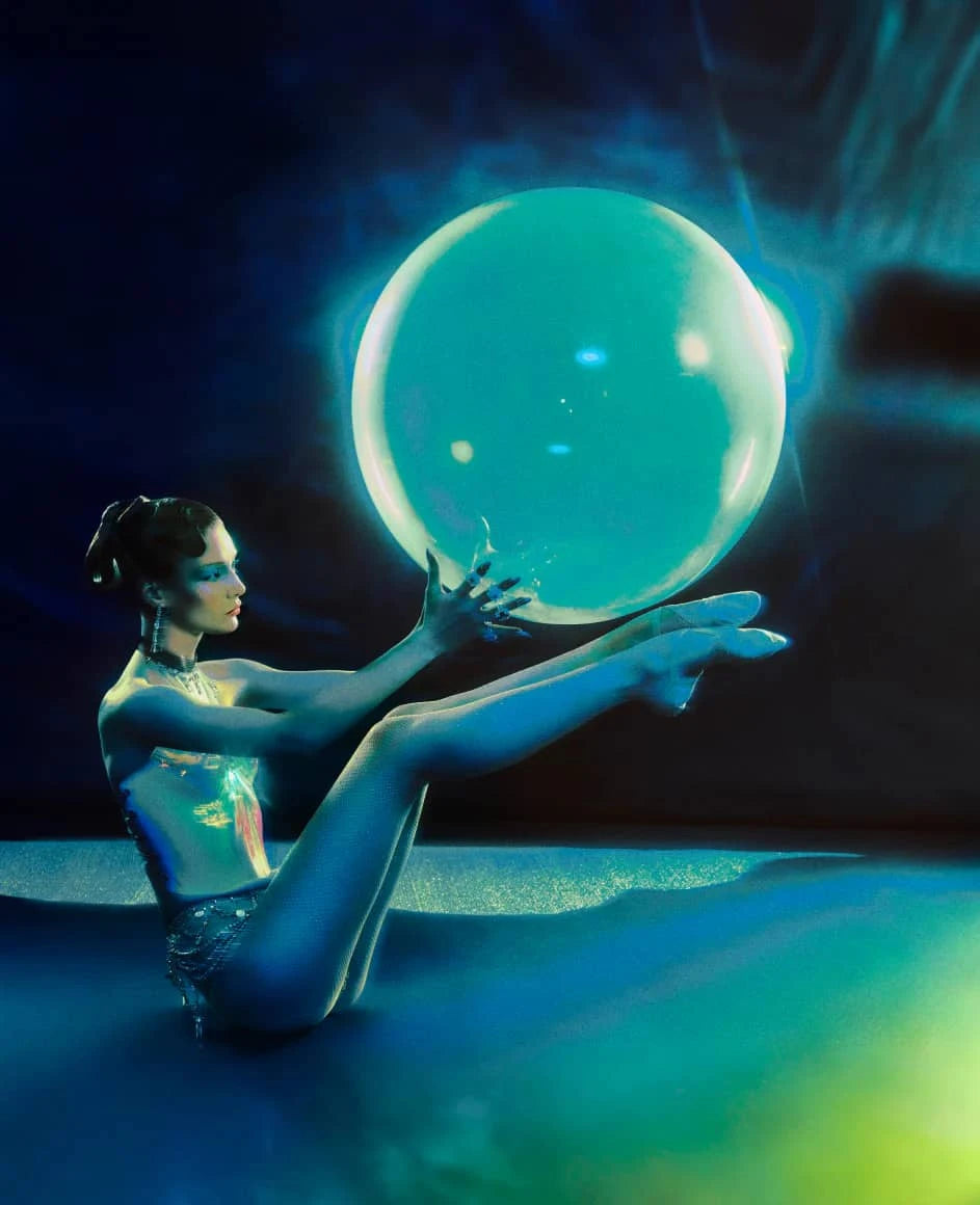 Cirque Du Soleil performer showcasing a unique gourmand fragrance with artistic styling and vibrant colors