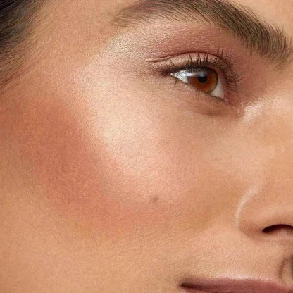 Westman Atelier Cream Highlight applied on skin for a luminous glow and natural finish