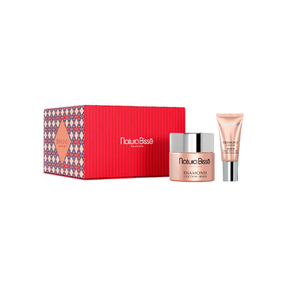 Natura Bissé skincare set with a red box, jar, and tube on a white background