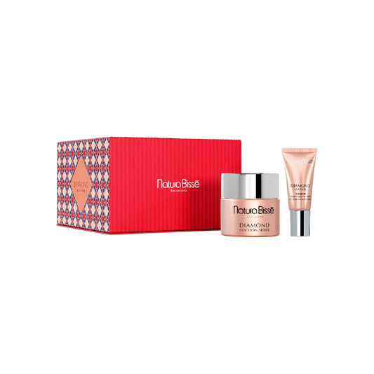 Natura Bissé skincare set with a red box, jar, and tube on a white background